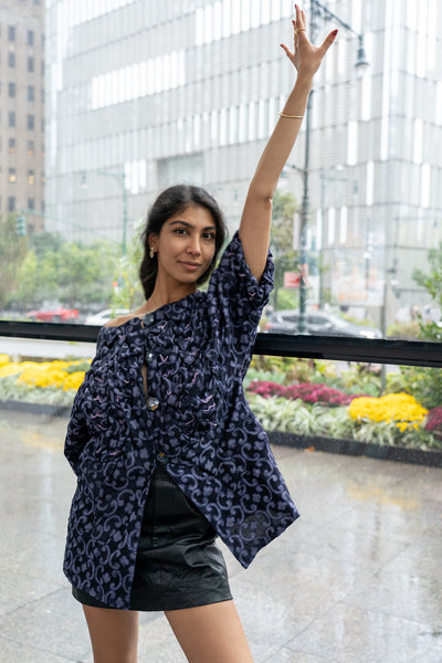 Blue smocked evening coat with beading