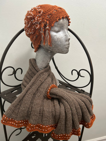Gray knitted scarf with orange beaded border